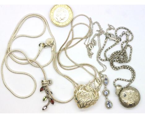 Four 925 silver necklaces with pendants. P&amp;P Group 1 (£14+VAT for the first lot and £1+VAT for subsequent lots) 