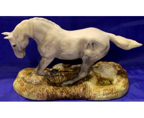 Boxed Beswick Camargue limited edition wild horse, L: 24 cm. Small chip to base otherwise no cracks, chips or visible restora