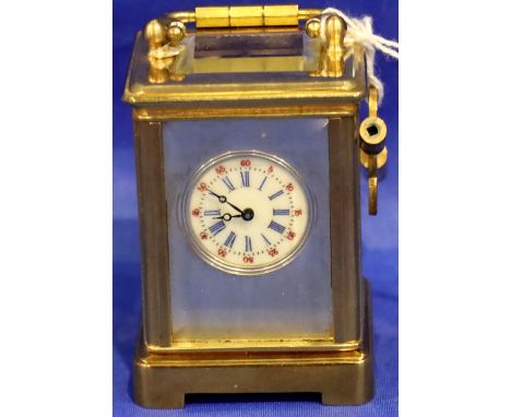 Miniature brass carriage clock with painted enamel dial, H: 50 mm. Working at lotting. P&amp;P Group 1 (£14+VAT for the first