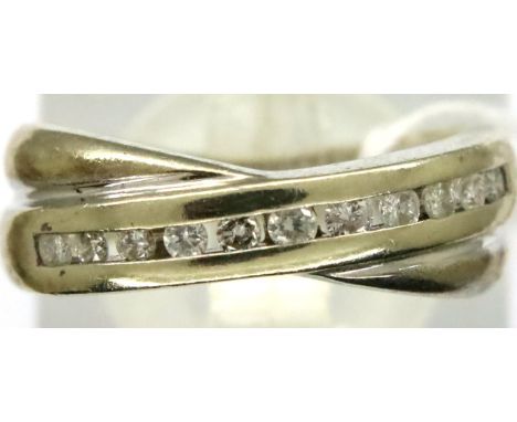 9ct white gold diamond channel set crossover ring, 0.25cts total, size L, 3.5g. P&amp;P Group 1 (£14+VAT for the first lot an