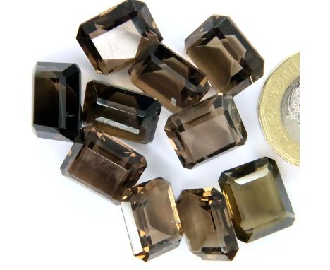 Ten loose smokey quartz stones, each 14 x 12 mm. P&amp;P Group 1 (£14+VAT for the first lot and £1+VAT for subsequent lots) 
