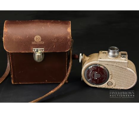 A vintage Bell & Howell model 605 double run eight cine-camera, with 0.5 Trital lens by Taylor, Taylor & Hobson, with leather