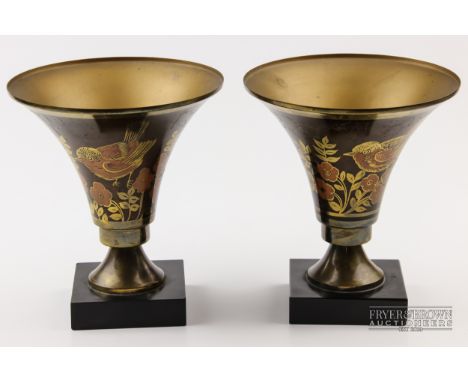 A. Ducobu - a pair of Art Deco bronzed metal vases or table lamps, decorated in gilt and burnt orange with robins and flowers