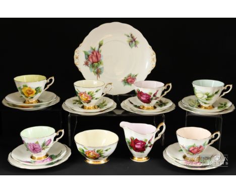 A part Royal Standard tea service, series of six Harry Wheatcroft roses, comprising milk jug, sugar bowl, cake plate, six sid