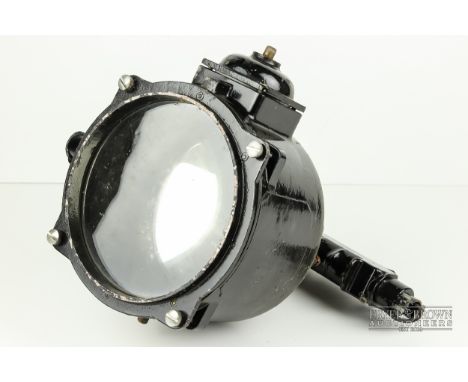 A vintage spotlight, possibly a US naval lamp, patent 5153, 6" lantern, numbered E3672