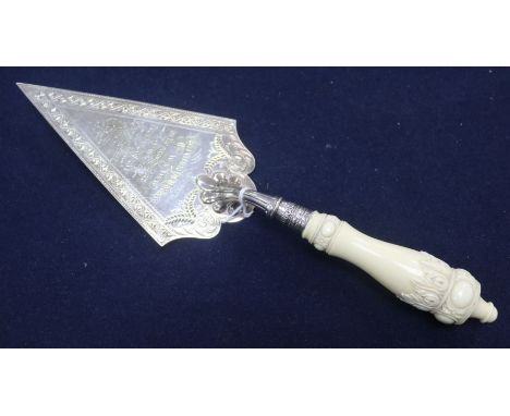 An electroplate and ivory handled trowel