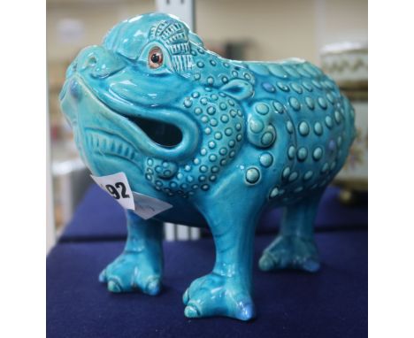 A Burmantofts turquoise toad spoon warmer