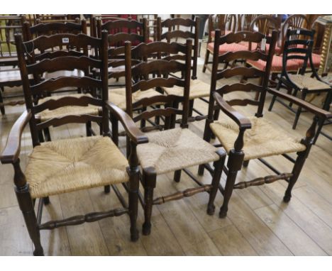 Six rush seat ladder back chairs (4 chairs and 2 carvers)