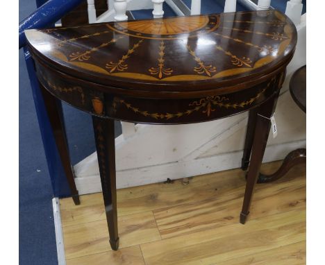 A George III marquetry inlaid mahogany card table, W.92cm