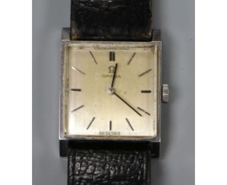 A lady's stainless steel Omega square dial manual wind wrist watch.