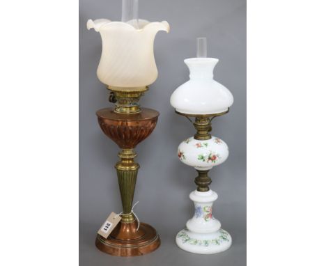 An Edwardian copper and brass oil lamp and a glass oil lamp