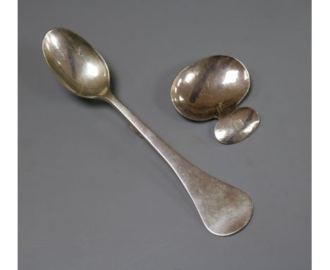 A modern silver caddy spoons and preserve spoon by Simon, J. Beer of Lewes, Sheffield, 2002 and 2011 respectively.