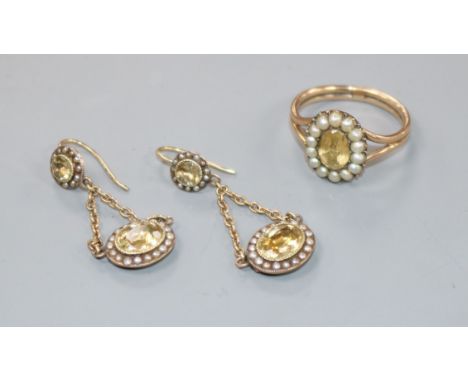 A 19th century yellow metal, citrine and seed pearl set oval ring and a pair of similar drop earrings.