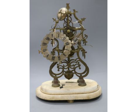 A 19th century brass skeleton clock, missing dome, (a.f.)