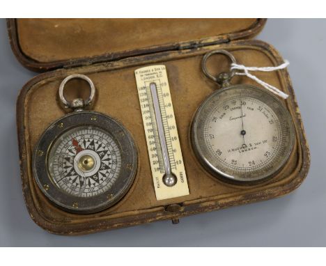 A Hughes &amp; Son pocket barometer, compass and thermometer set, cased
