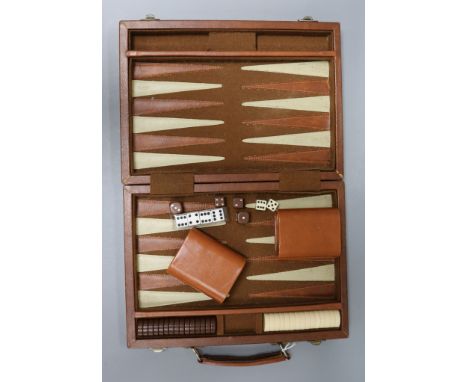 A vintage Gucci leather-covered backgammon set