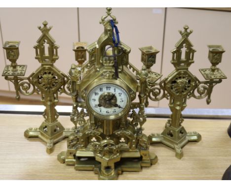 A French ormolu mantel clock with associated garniture height 43cm
