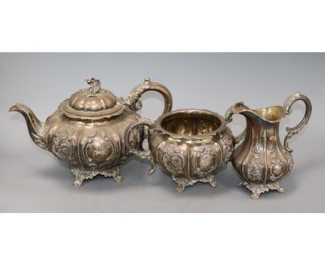 A Victorian embossed silver three-piece tea service, London 1848/50, makers Samuel Hayne &amp; Dudley Cater, (faults) gross 4