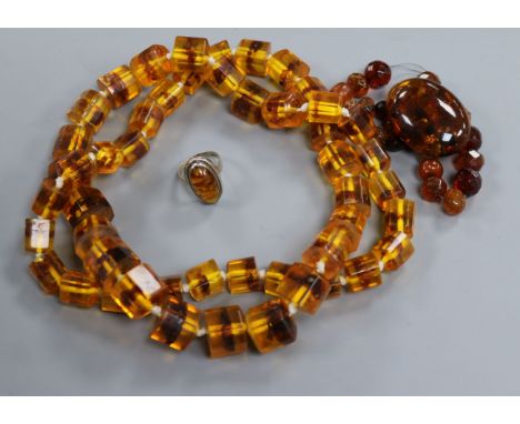 An amber necklace, bracelet, ring and brooch.