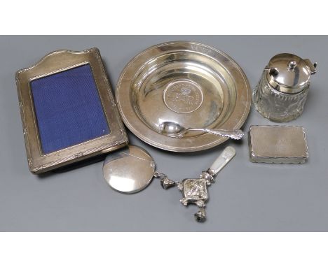 A George V engine turned silver snuff box, an Edwardian silver circular vesta case and five other items including a silver ph