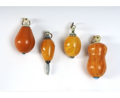 A Collection of 14 Light Pulls believed to be Russian.  Made of Amber, Turquoise and Gold