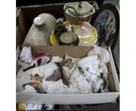 A box containing a selection of domestic pottery and porcelain to include avian figurines, Gaudy Welsh design teacups and sau