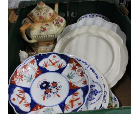 A box containing a selection of domestic pottery to include an apricot ground teapot on stand 