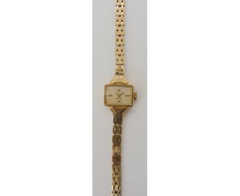 A 9ct gold ladies vintage Rotary watch, circa 1964 - 65, length of strap 19.5cm, weight including mechanism 14.4gms Condition