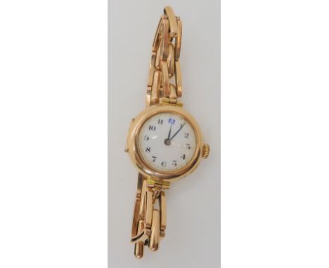A 15ct gold ladies vintage watch, weight including mechanism 24.5gms Condition Report: Available upon request