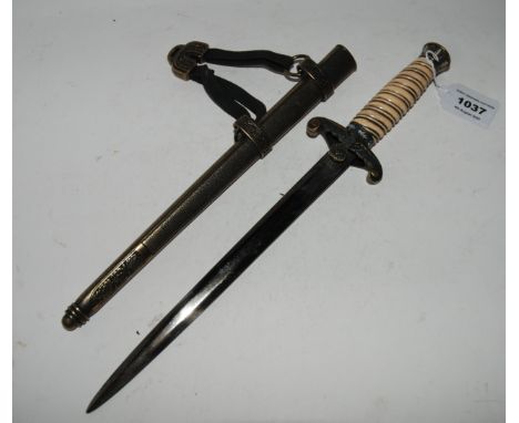 A replica German army dagger 40cm. o/all length Condition Report: Available upon request