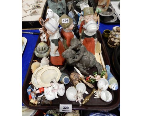 Assorted ceramic figures including a pair of Goebel Eastern figures, a pair of Dutch figures etc Provenance: The Late Dr Hele