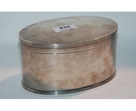 A silver tea caddy Glasgow 1943, of oval shape 17cm x 10.5cm x 8.8cm 570 grams. Condition Report: Available upon request