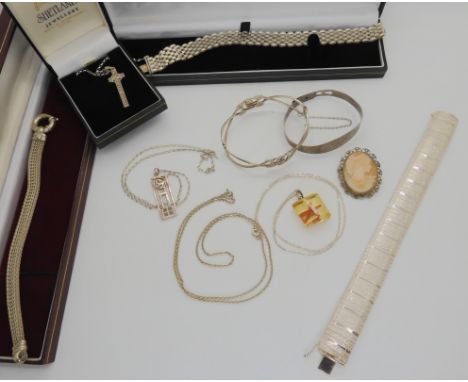A silver cross and chain by Shetland silver, a Mackintosh style bangle and other items Condition Report: Not available for th