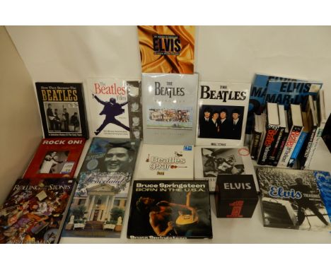 A copy of The Beatles Anthology together with various Elvis, Rolling Stones and pop culture books Condition Report: Available