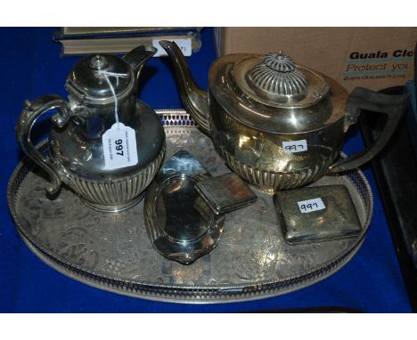 A lot comprising a teapot, water pot toastracks, tray etc Condition Report: Available upon request
