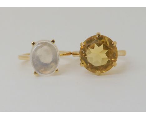 A 9ct gold moonstone set ring size J, together with a 9ct gold citrine set ring size L, weight combined 7.3gms Condition Repo