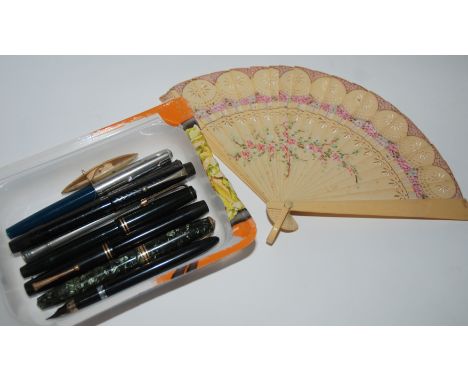 A silver-cased fountain pen, six other vintage pens, hand fan etc Condition Report: Available upon request