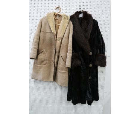 A fur trimmed velvet coat and three sheepskin coats Provenance: The Late Dr Helen. E. C. Cargill Thompson Condition Report: v
