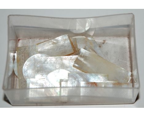 A collection of mother of pearl counters Condition Report: Available upon request