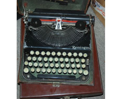 A Remington typewriter and a leather case (2) Provenance: The Late Dr Helen. E. C. Cargill Thompson Condition Report: Availab