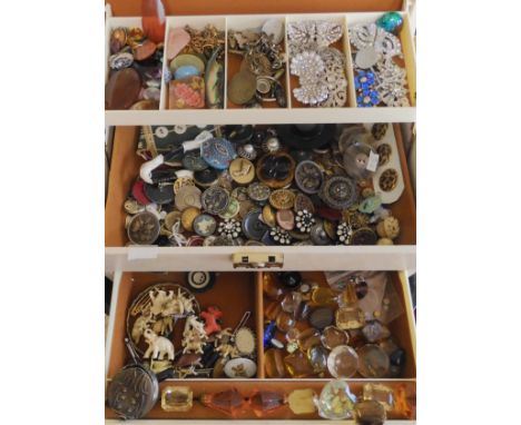 A jewellery box full of vintage costume to include, Deco clips, buttons, loose semi-precious and faux gems Condition Report: 