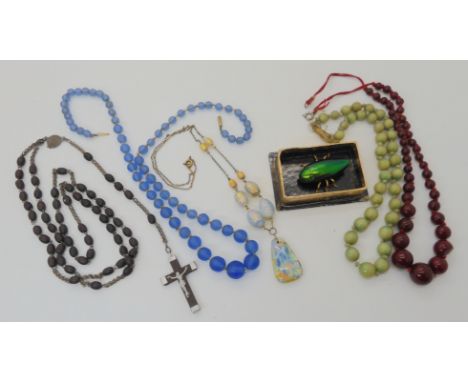 A large jewel beetle brooch (Needs new clasp) a 'faux opal' glass necklace, and other items Provenance: The Late Dr Helen. E.