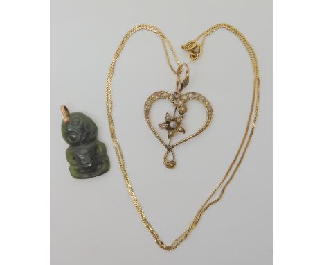 A 9ct gold Edwardian pearl set heart pendant, dimensions with bail 3.8cm x 2.4cm with a 9ct snake chain, 47cm, weight 3.8gms,