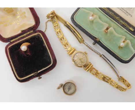 Three 15ct gold pearl shirt studs in a Hamilton & Inches vintage box (one pearl missing) weight combined 2gms, a futher yello
