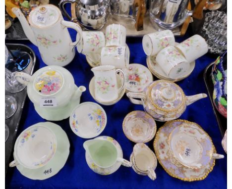 A Coalport tea for one with lilac and gilt decoration, a Paragon Fragrance tea for one, together with Hammersely Viola decora