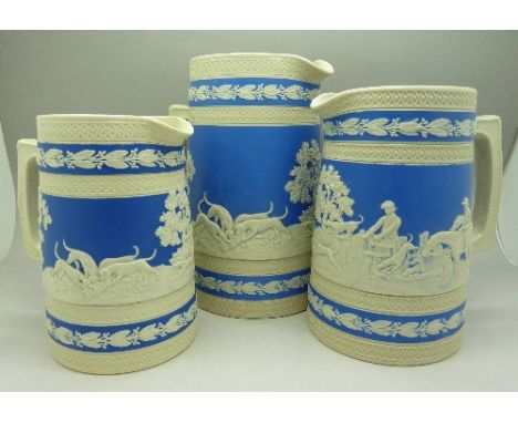 A set of three graduated Copeland Spode relief moulded jugs with hunting scenes, one a/f, chip to base of small jug