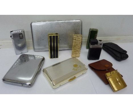 A gold plated Ronson lighter and other lighters, etc.
