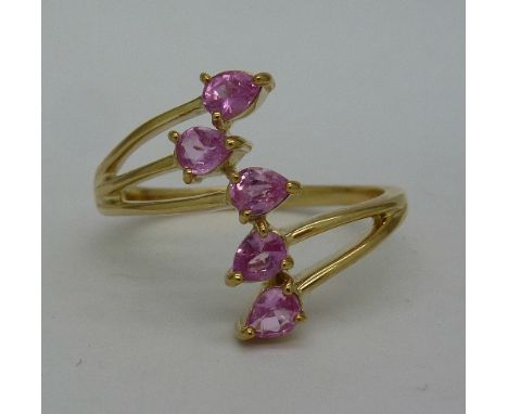 A 9ct gold and five pink stone ring, weight 3.3g, size S