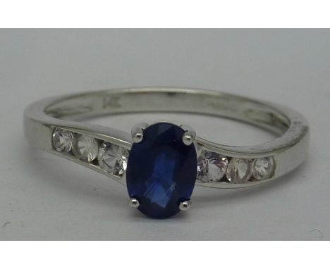 A 14ct gold, blue and white stone ring, weight 2.5g, size T