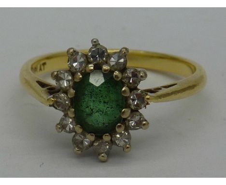 An 18ct gold, green stone and diamond cluster ring, weight 3.3g, size N